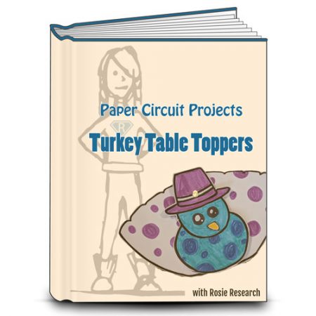 Rosie Research orange book cover with the title Paper Circuit Projects: Turkey table topper. Image of Rosie Research girl logo and a turkey table topper project with LED.